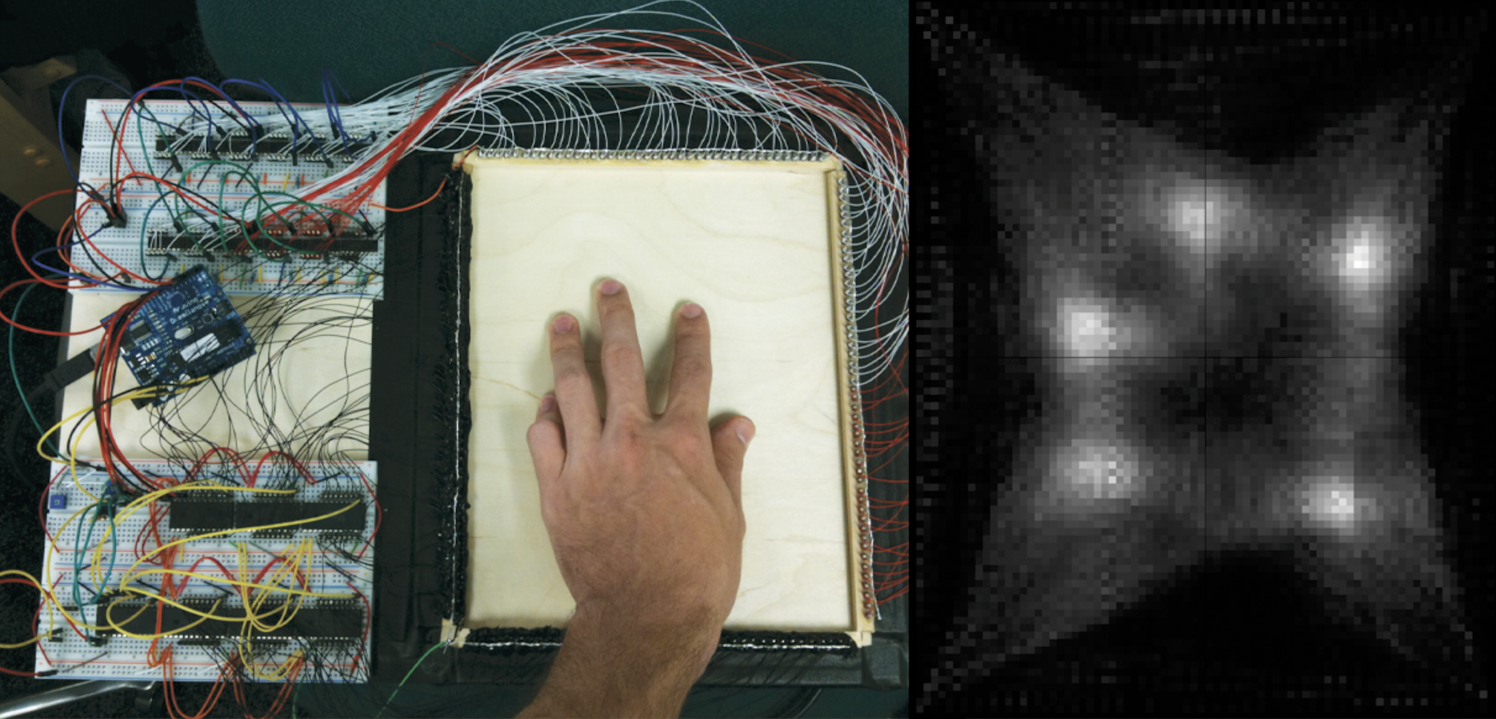 Scanning FTIR: Unobtrusive Optoelectronic Multi-Touch Sensing through Waveguide Transmissivity Imaging
